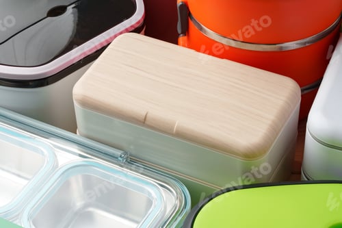 Vista previa: Many plastic food containers in a shop for background