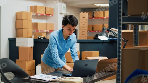 Preview: Caucasian woman putting merchandise in packages