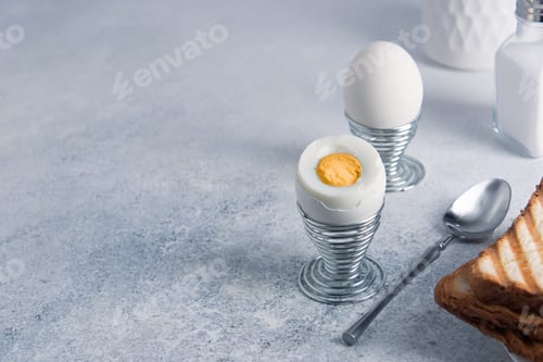Preview: Breakfast of two hard-boiled eggs and toast.