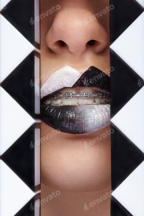 Preview: Close up photo of lips with black and white lipstick