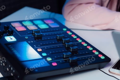 Preview: Mixing console on table near smartphone