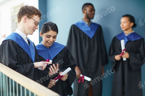 Preview: University graduates indoors