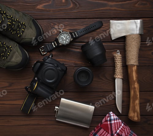 Preview: Hiking Gear and Accessories on Wood Background