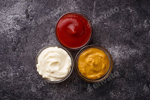 Preview: Set of different sauces: mustard, ketchup, mayonnaise.