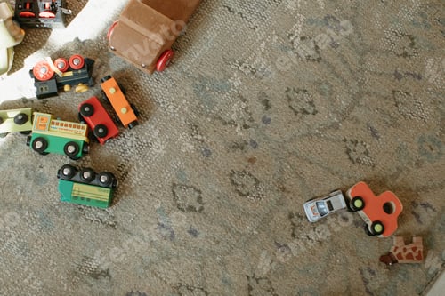 Preview: Toy cars and trains on patterned rug