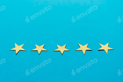 Preview: yellow stars isolated on blue with copy space