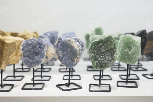 Preview: Various rocks are showcased on a table for art display