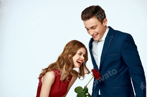 Preview: Young couple charm dating romance relationship embrace light background
