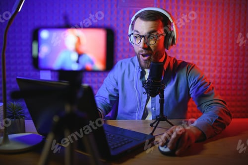 Preview: A video blogger records content in his studio.