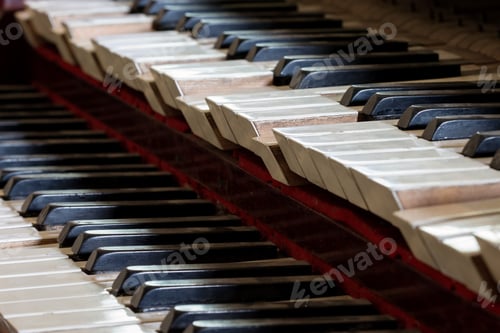 Preview: Abstract detail of old, broken and dusty organ keys