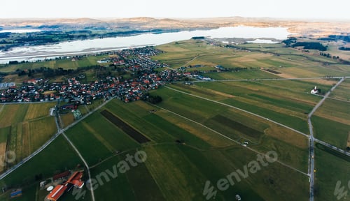 Preview: Aerial landscape of town in rural fields
