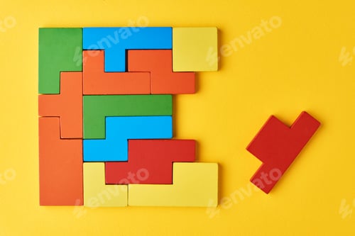 Preview: Logical thinking concept. Different shapes colorful wooden blocks on white background