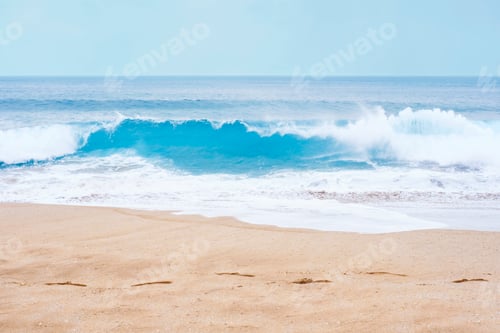 Preview: A sea wave with foam and sandy shore, summer background.