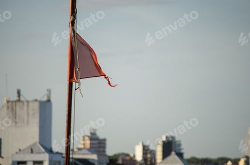 Preview: Closeup shot danger flag on the beach