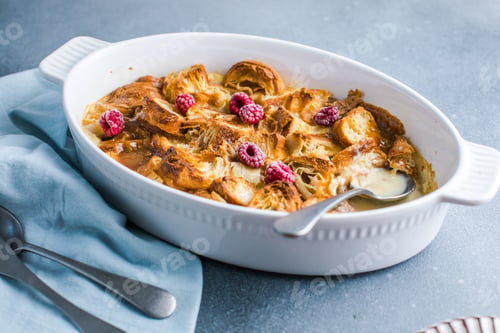 Preview: Croissant bread pudding with custard creamy sauce and vanilla ice cream very delicious dessert