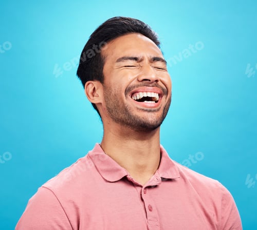 Preview: Laughing, funny comedy and man in studio isolated on a blue background. Comic, humor and male perso