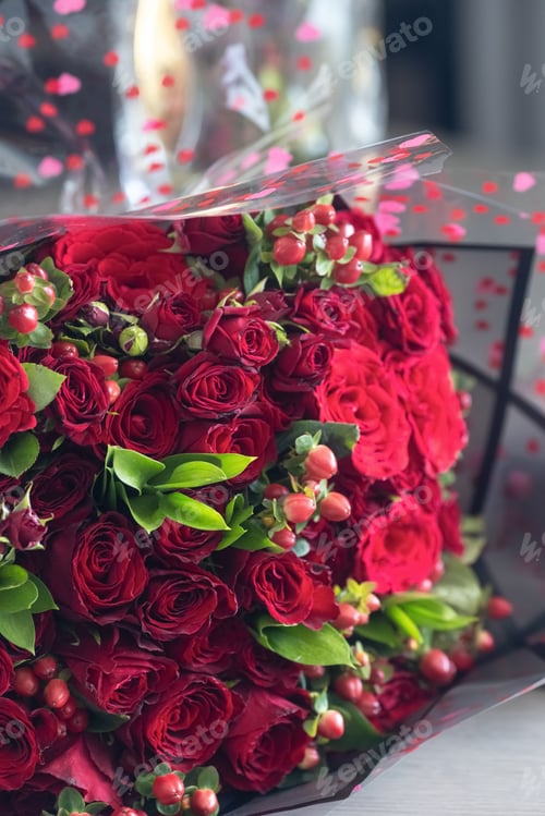 Preview: red roses bouquet festive background with gold elements and gift box ,template greetings card banner