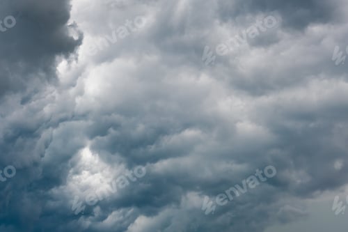 Preview: dramatic cloudy dark clouds before a storm. deep blue and grey heavy clouds. weather forecast.