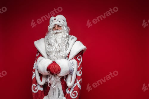 Preview: old father frost in long warm coat, red gloves and a hat