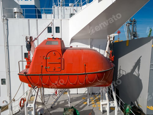 Preview: lifeboat on a cargo ship, for emergency evacuation. The boat is seen up close, with parts of the