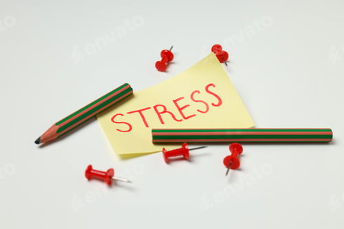 Preview: Paper with word Stress and broken pencil on white background