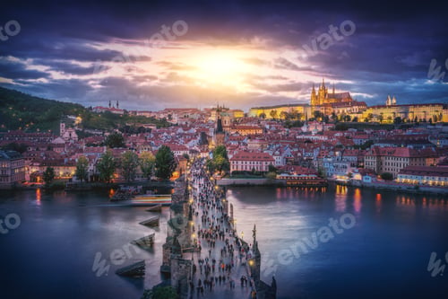 Preview: Aerial view of Charles Bridge at sunset with Prague Castle Skyline - Prague, Czech Republic