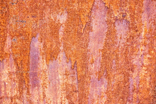 Preview: Orande rusty abstract painted metal background. texture of old plate with brown rust