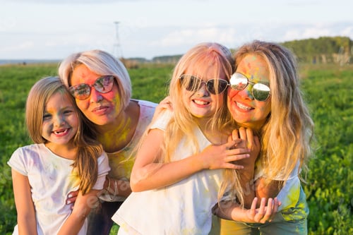 Preview: Festival of holi, people concept - Group of young people having fun outdoors