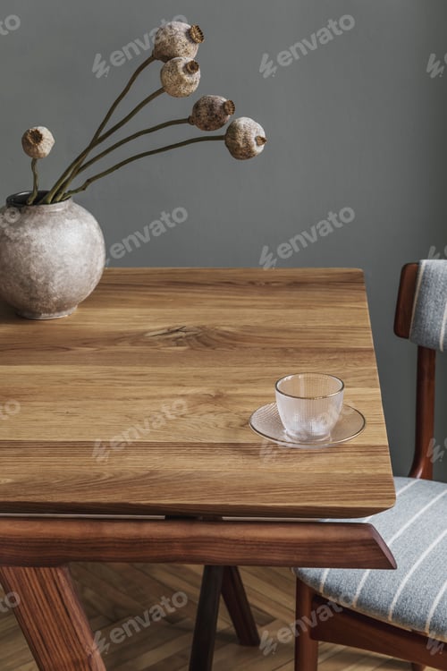 Preview: Stylish and modern dining room interior with design sharing table.