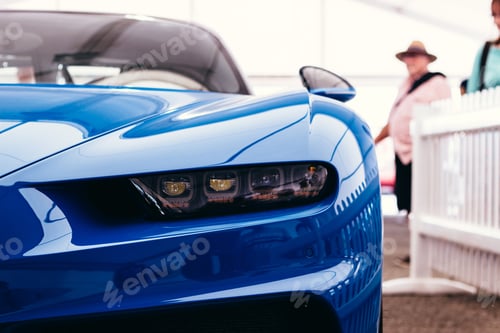 Preview: Closeup shot of a cool luxurious blue car ready to take on and take you to the stars