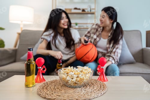 Preview: LGBT Soccer or Sport fans emotionally watching game in the living room