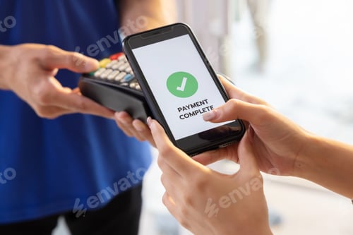 Preview: Woman Using Phone Payment to Transfer Money to Shop Seller