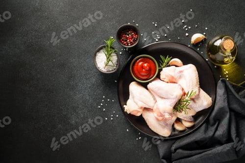 Preview: Chicken wing, raw chicken meat with herbs.