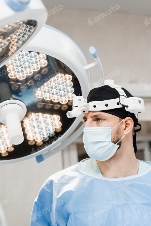 Preview: Surgeon in Operating Room Wearing Surgical Mask