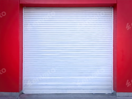 Preview: White Roll-up Door on Red Wall of the Garage