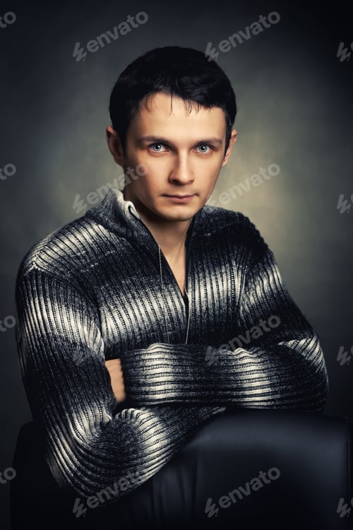 Preview: Young Man Portrait On Dark Background