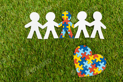 Preview: Top view of special kid with autism among another and decorative puzzle heart on green background