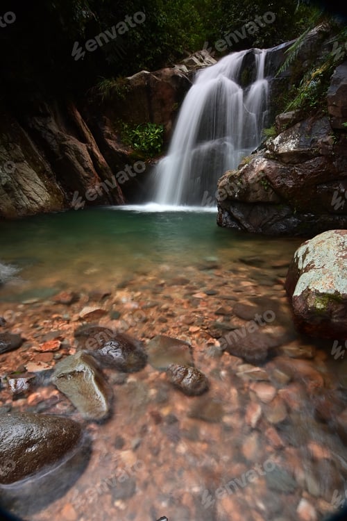 Preview: A river with clear water with a small waterfall