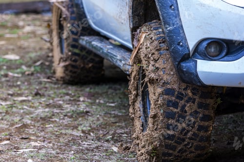 Preview: Tire has been mired in the mud. Wheel closeup with a muddy. Wheel of tire is dirty because mud