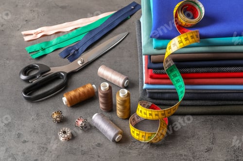 Preview: Sewing Accessories Still Life on Gray Background