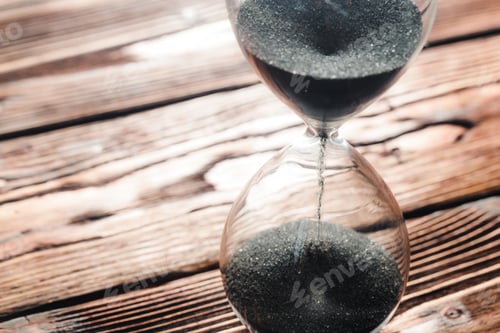 Preview: Modern hourglass on wooden background