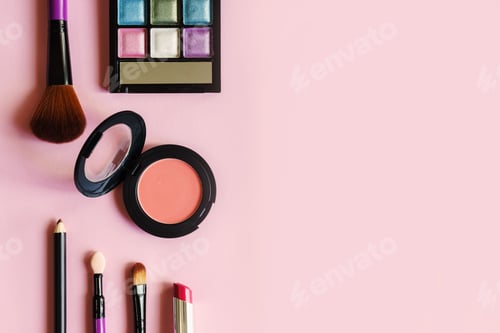 Preview: various makeup products and cosmetics isolated on pink