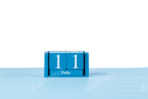 Preview: Wooden calendar July 11 on a white background