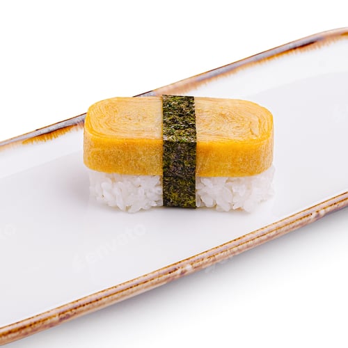Preview: Unique sushi piece featuring tamago on a white plate with a rustic edge