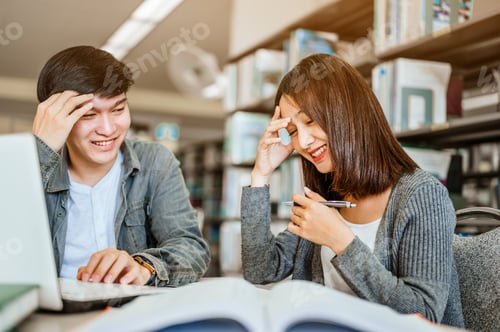 Preview: Two students are reading and discussing about exam preparation, Male feeling stressed and having