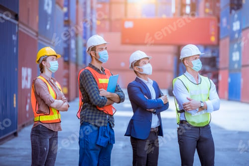 Preview: Portrait team dock workers posing under working and checking production process on dock container wa