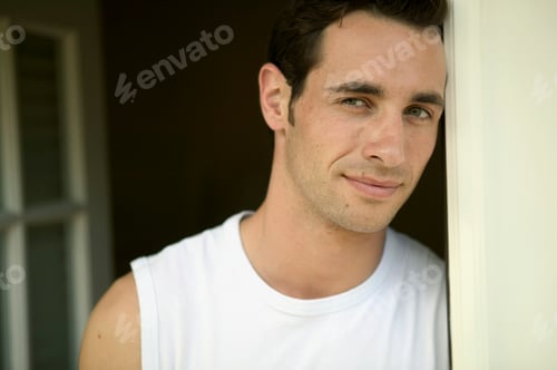 Preview: Young man standing in doorway