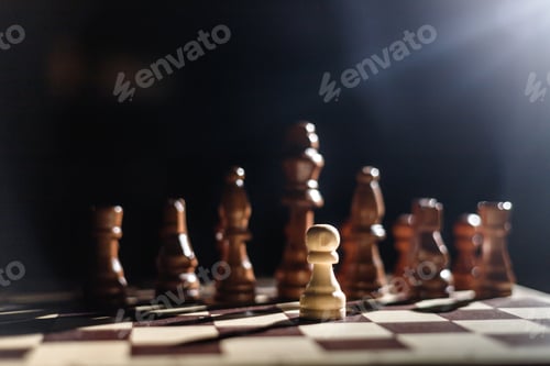 Preview: One pawn staying against full set of black chess pieces. One against all. Hero
