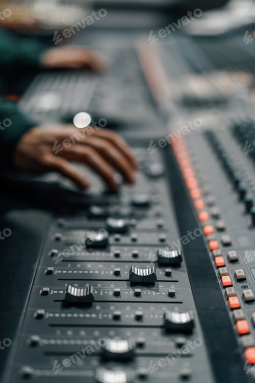 Preview: Sound engineer used digital audio mixer Sliders Engineer presses keys Control panel Recording studio