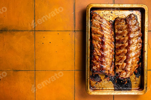 Preview: Barbecue grilled pork spare ribs. Orange background. Top view. Copy space